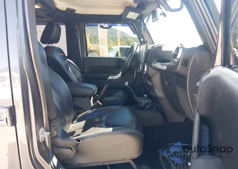 2014 Jeep Wrangler Unlimited Sahara z USA, uszkodzony, nr VIN 1C4BJWEG8EL207160